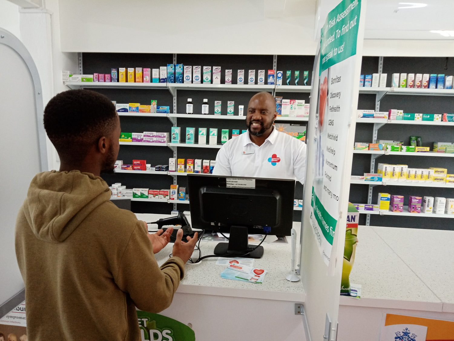 Northview pharmacist assisting a customer